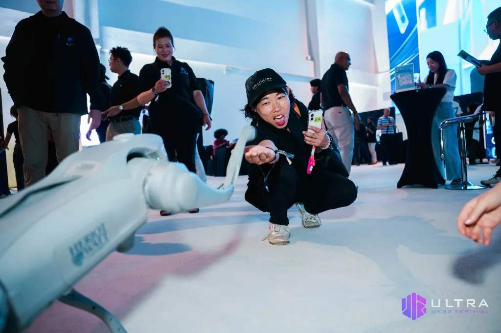 A guest exploring an interactive robotics activation